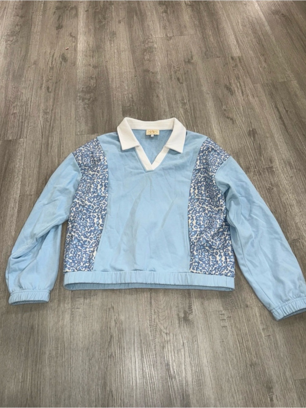 Light Blue V-Neck Pullover with White Collar and Floral Side Panels